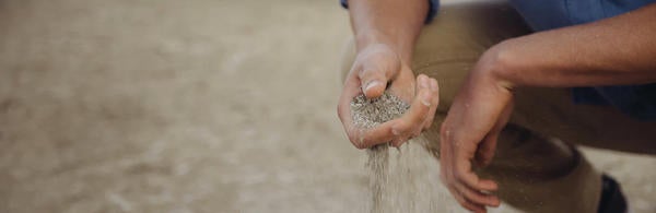 Sand going through hand